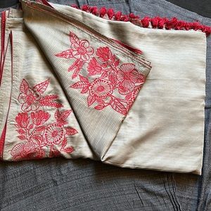 Saree with custom embroidery and tassels. Perfect for winter occasions.